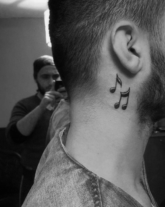 tatuaje musical simple para hombre 25
