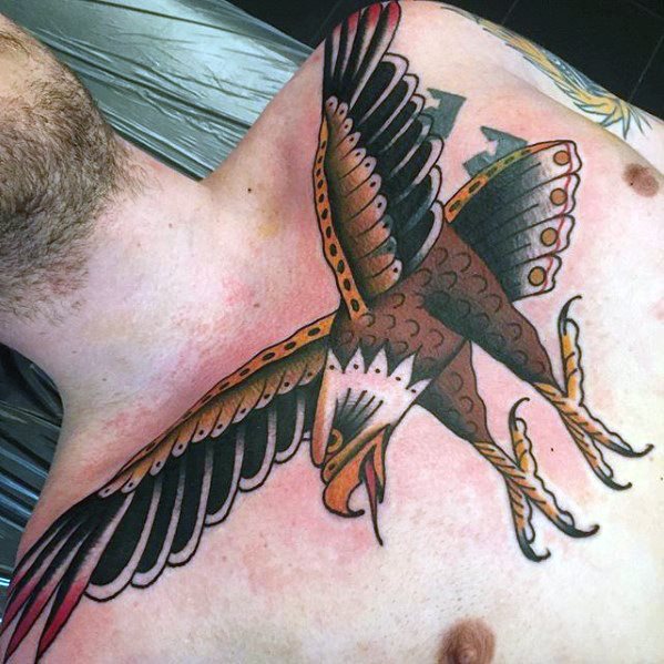 tatuaje tradicional pajaro para hombre 11