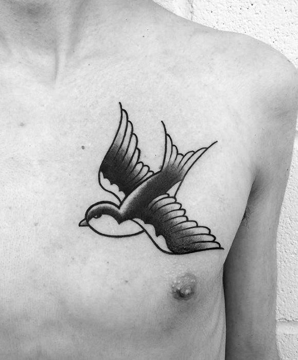 tatuaje tradicional pajaro para hombre 15