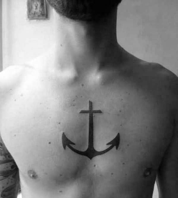 tatuaje ancla con cruz para hombre 10