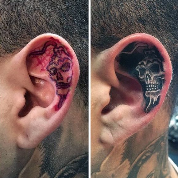 tatuaje en la oreja para hombre 63