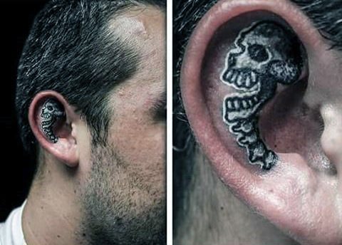 tatuaje en la oreja para hombre 91