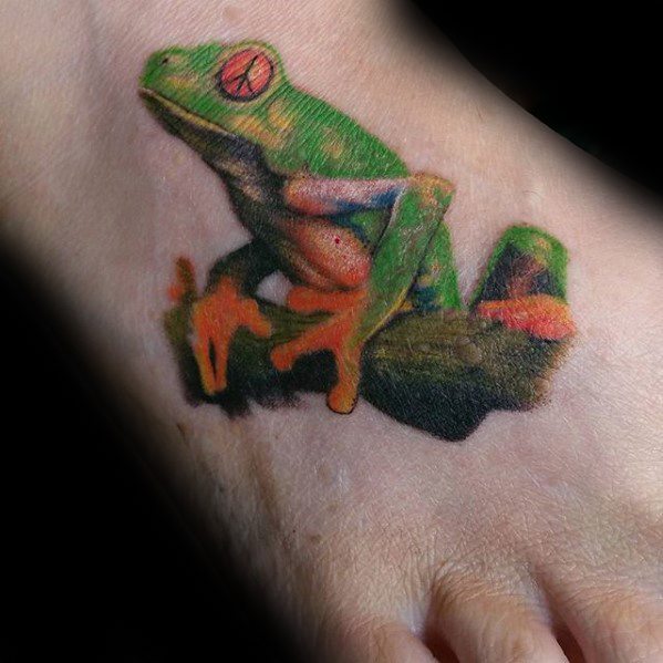 tatuaje rana en arbol para hombre 04