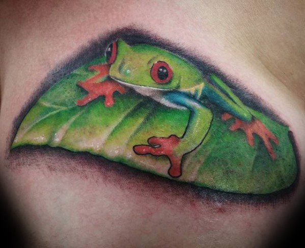 tatuaje rana en arbol para hombre 14