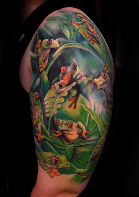 tatuaje rana en arbol para hombre 15