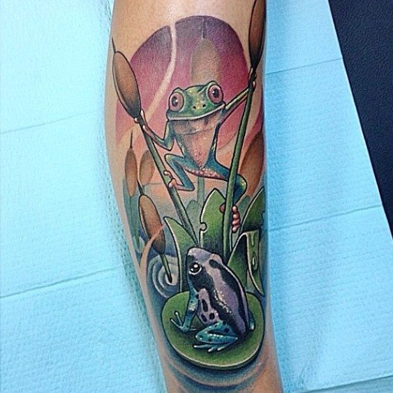 tatuaje rana en arbol para hombre 26