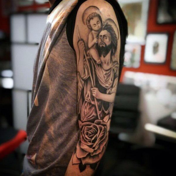 tatuaje san cristobal para hombre 24