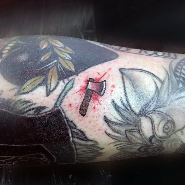tatuaje hacha pequena 79